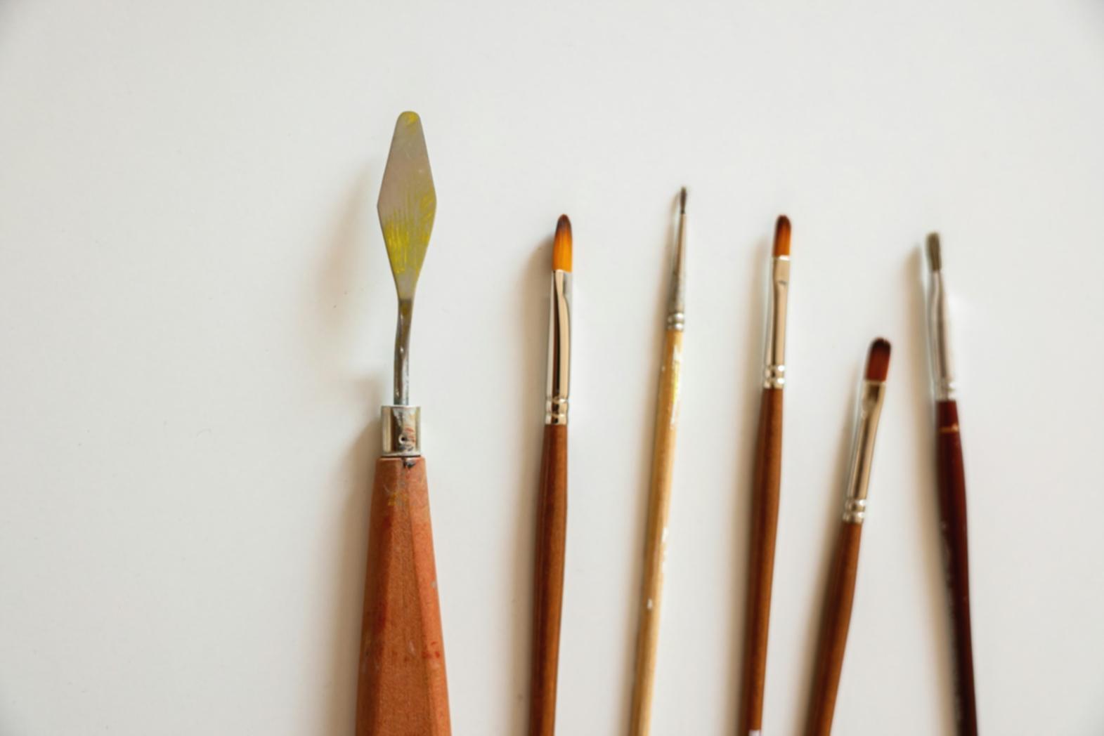 Student sketching architectural forms with precision pencil technique